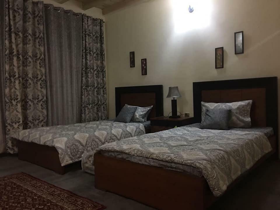 Embassy Villa Suites Karimabad  エクステリア 写真