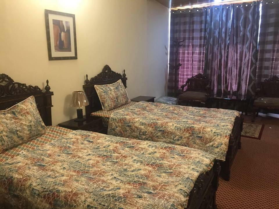 Embassy Villa Suites Karimabad  エクステリア 写真